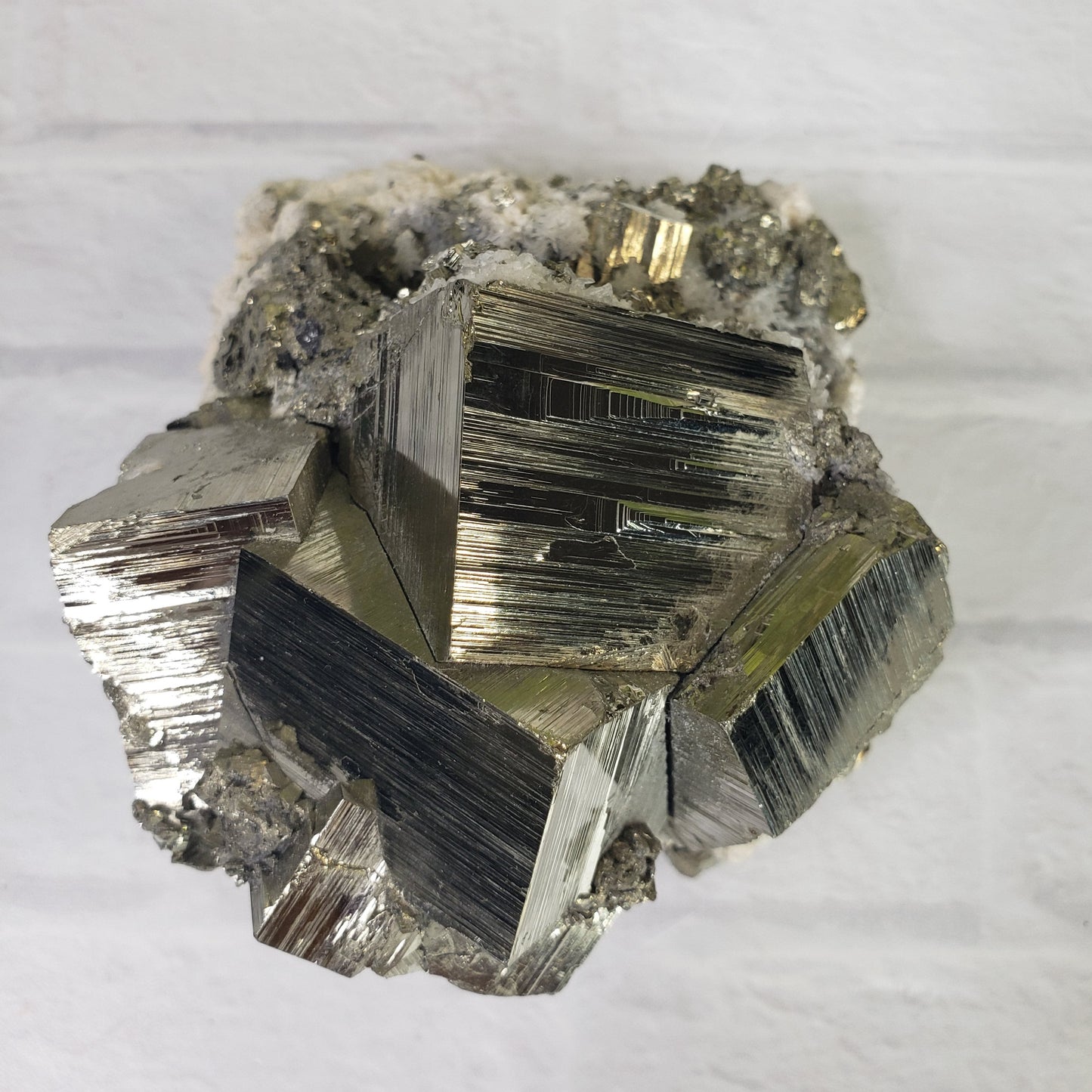 Cubic Pyrite with Quartz on Matrix